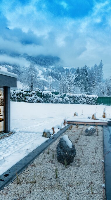 Sauna World Kristallsauna mit Thermalwasser Badesee im Winter | © Alpentherme Gastein/Wolkersdorfer