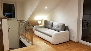 The Apartement Couch im Stiegenbereich | © The Apartement Couch